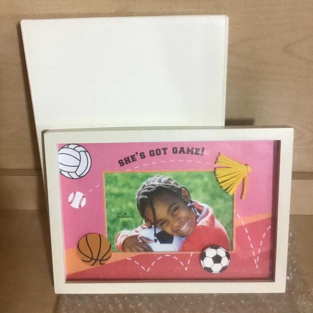 “ She’s got game “ picture frame from Hallmark.